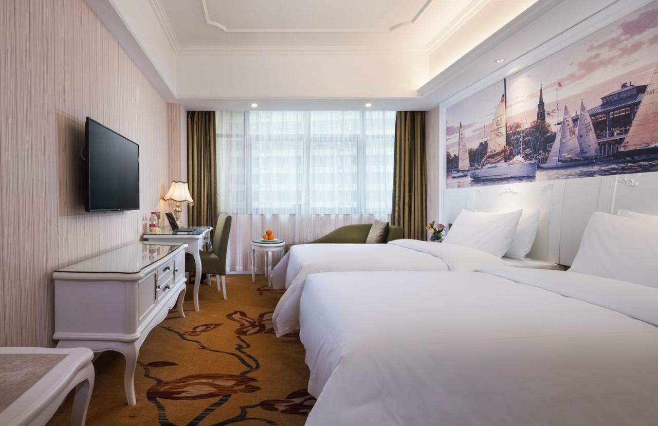 Vienna International Hotel Fenghua Zhongshan Road מראה חיצוני תמונה